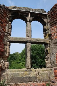 A window frame facing the front of the gatehouse