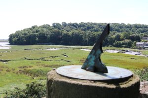 A sundial on the curtain wall
