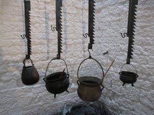 Cooking pots in another of the kitchen fireplaces