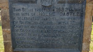 The plaque also marks the site of Holme Castle, which was destroyed in the 14th century