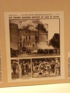 Press cutting showing the castle on fire (from an exhibition board at the castle)