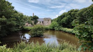 The Priory across the lake