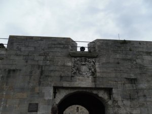 King Charles II coat of arms above the castle entrance