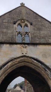 A statue of an angel with a shield