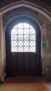 Arched doorway from the dining hall to the gardens