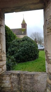 The church of St Mary viewed through one of the window openings at the gatehouse