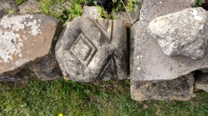 Pieces of stone form the abbey, piled up as their original position is unknown