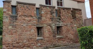 Part of the original castle wall in College Green