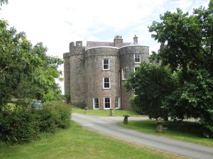 Side view of the castle with large windows, added later