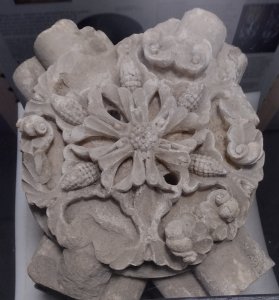 Ceiling boss depicting seed pods or possibly pine cones. Has traces of red colour as the boss was originally painted