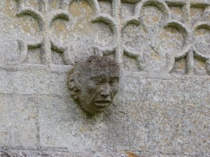 Detail of head on outside wall of prior's lodgings