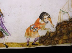 Detail from an information board: Dad thought the gloves in the man's belt were a set of ghostly hands playing the flute!