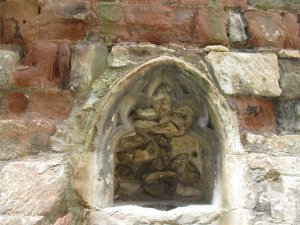 A piscina, for washing out he holy chalice