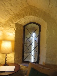 An arrow slit window in the living room....