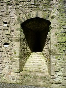 Ground floor window blocked off when the motte was built up around the castle