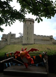 Zog the Dragon in front of the castle