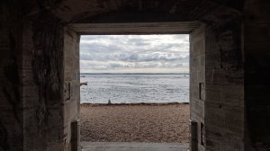 Access to the beach through the arches