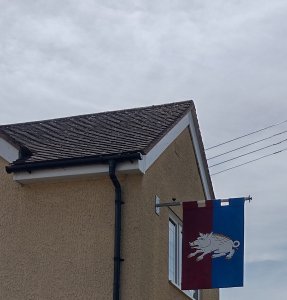 Richard of York's standard on display on a house in Tewkesbury