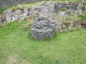 Remains of the stone stack holding up the hearth above
