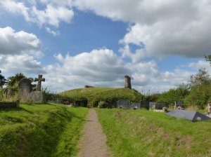 View of the castle on the motte from the churchyard