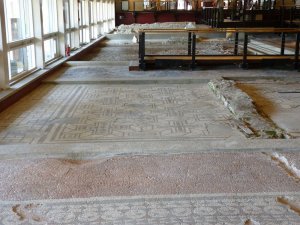 This black & white mosaic was found under the dolphin mosaic