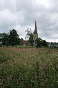 The castle is situated in a field behind the church