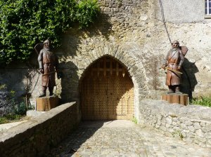 Wood carvings guarding the gateway