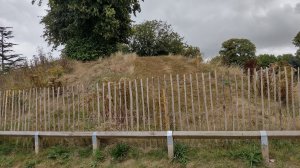 All that remains of the castle is a low mound behind a fence
