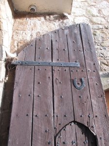 Door to the gatehouse- and a roosting pigeon!