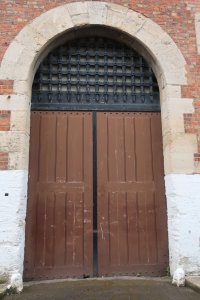 A rather imposing prison door.