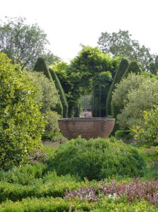 A large cauldron used as a pond