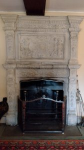 A restored tudor fireplace in the former chapter house