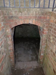 Steps down to the brick built cellar