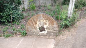 Mill stone ornament