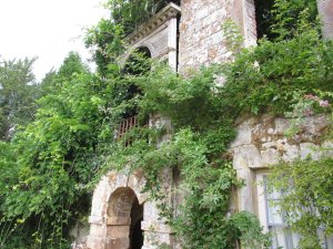The east range wall, now part of the garden
